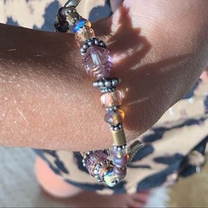 One size fits all bead and charm bracelet.